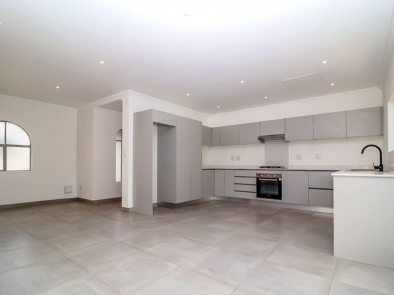 Modern Comfort Meets Secure Garden Living! - Photo 8