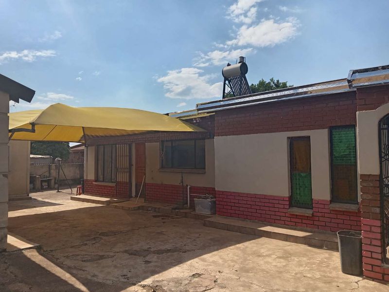 Charming Home with Expansive Yard and Versatile Outdoor Room! - Photo 2