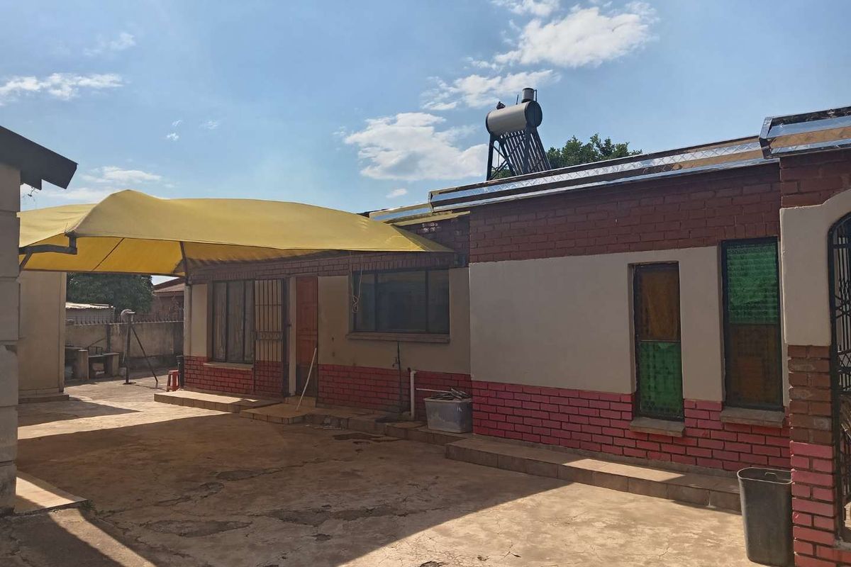 Charming Home with Expansive Yard and Versatile Outdoor Room! - Photo 2