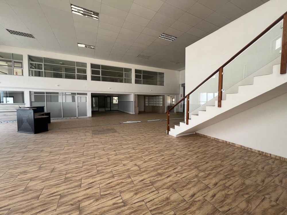 Main entrance reception area, offices and upstairs entertainment area