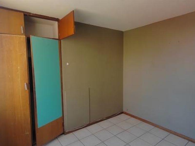 Unlock Potential in This Spacious 3-Bedroom Apartment - Photo 7