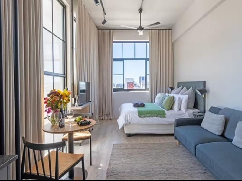 97% Airbnb Occupancy | Fully Furnished | Prime Zonnebloem Investment - Photo 4