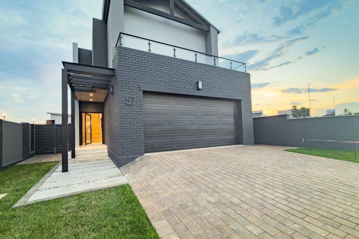 Overview  This modern double-storey home offers the perfect combination of style, privacy, and functional family living.  Designed with comfort - Photo 5