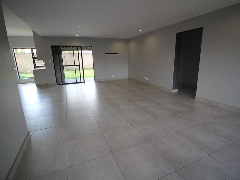 Modern 3-Bedroom Home with Solar in Brooklands Lifestyle Estate - Photo 5