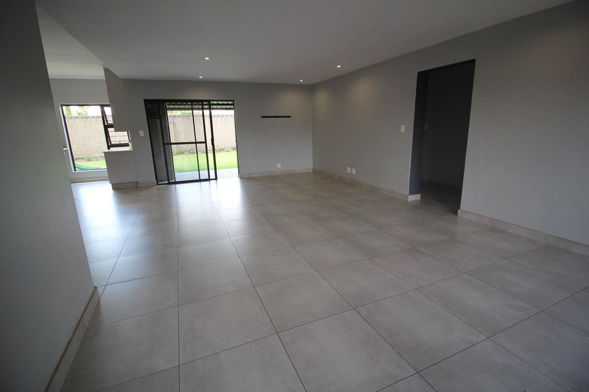 Modern 3-Bedroom Home with Solar in Brooklands Lifestyle Estate - Photo 5