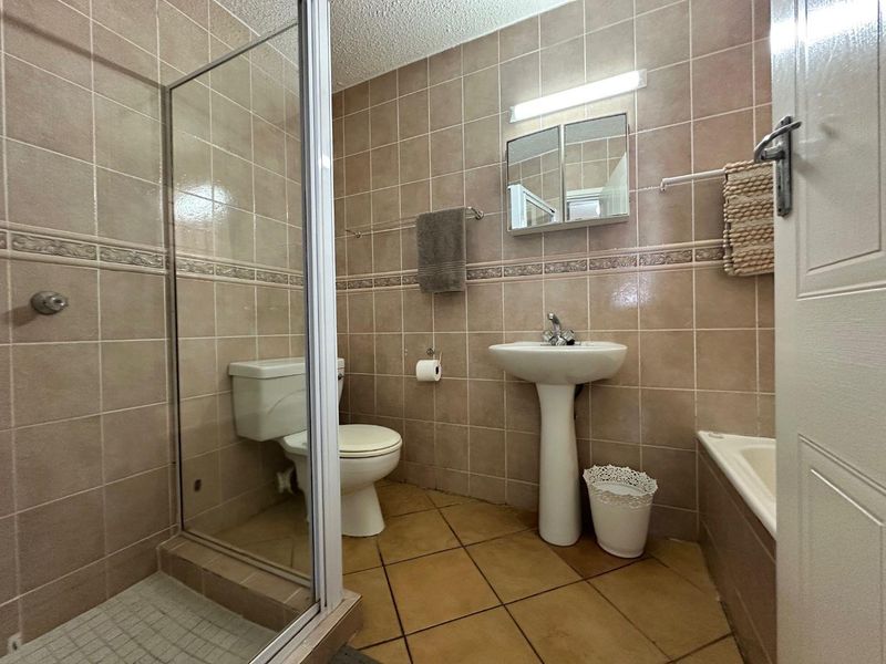 Beachfront Bliss – Ground Floor Apartment | Beachcombers Complex - Photo 9