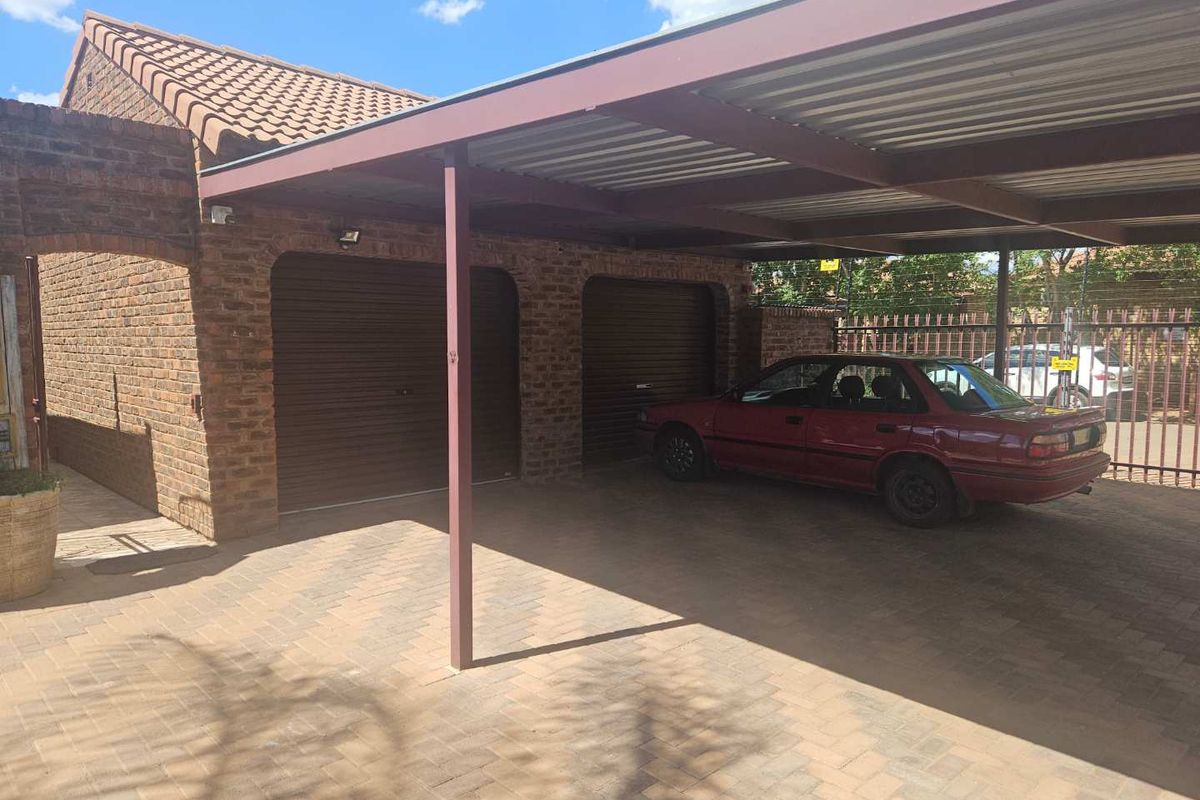 Charming Face-Brick Family Home with Modern Amenities and Exceptional Security - Photo 2