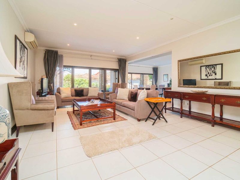Experience exclusive coastal living in this luxurious, lock-up-and-go apartment within the prestigious Zimbali Coastal Resort. - Photo 9