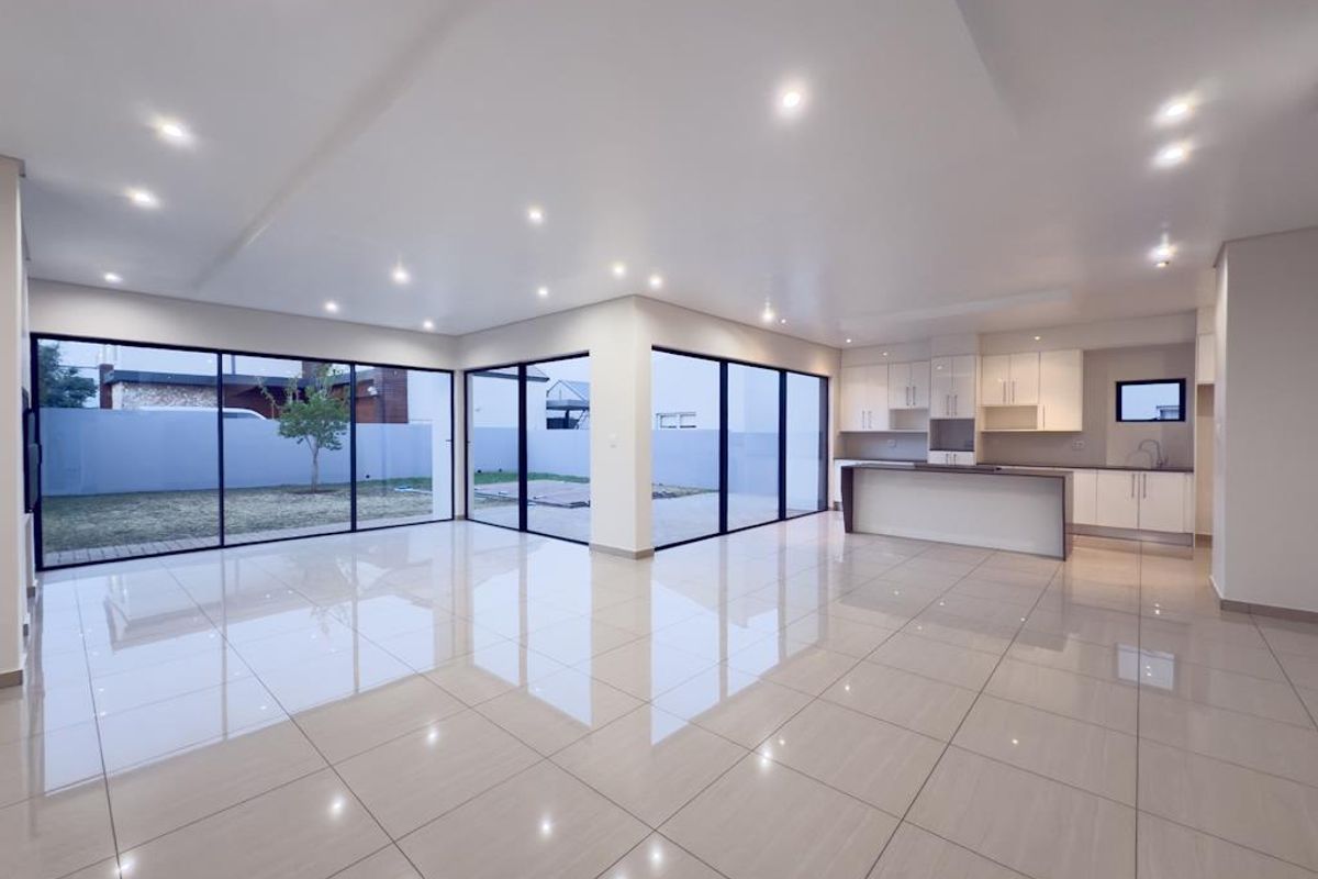 Modern Architectural Gem with Versatile Living & Expansive Balcony in Midstream Meadows - Photo 3