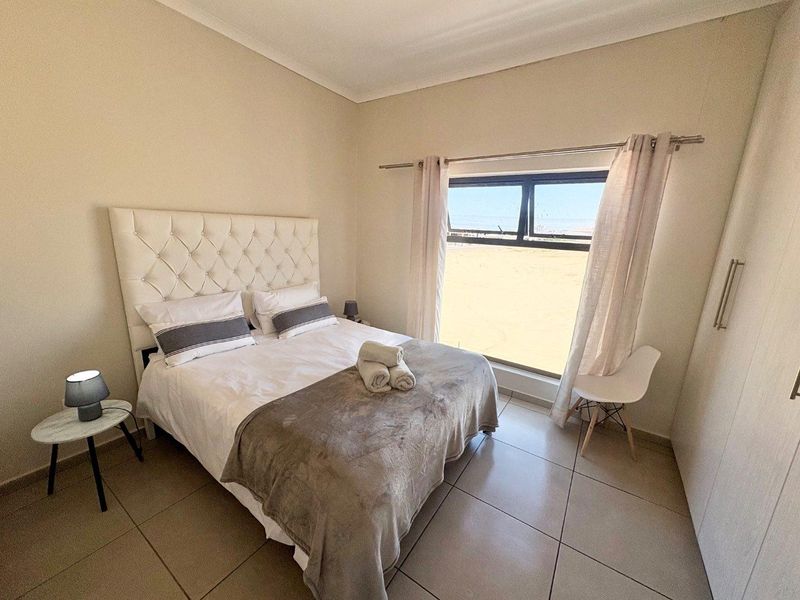 Fully Furnished 2x Bedrooms Townhouse To Rent in Dolphin Beach - Photo 9