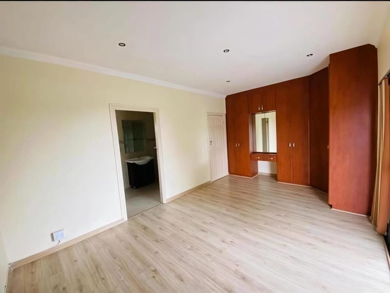 Architectural Masterpiece with Private Oasis in Queensburgh's Malvern - Photo 8
