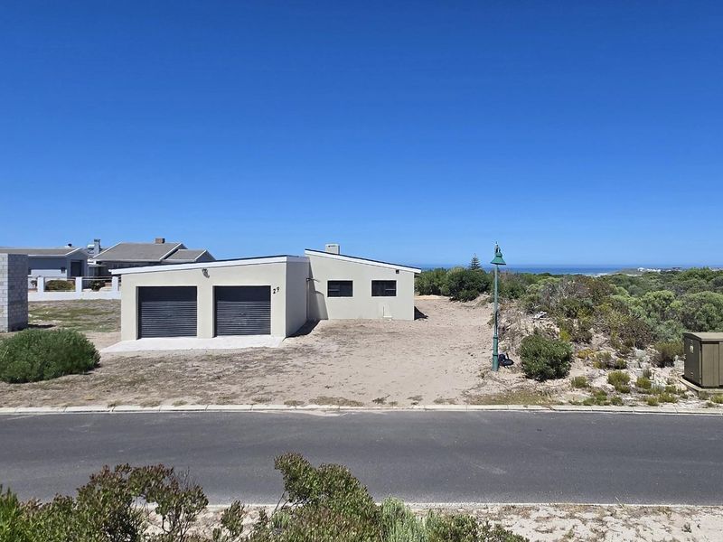 Invest in a Seaside Home with Endless Coastal Activities Nearby - Photo 2