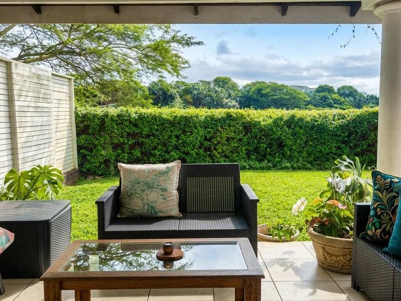 Investor’s Dream: 3-Bed, 2-Bath Duplex on Golf Estate - Photo 2