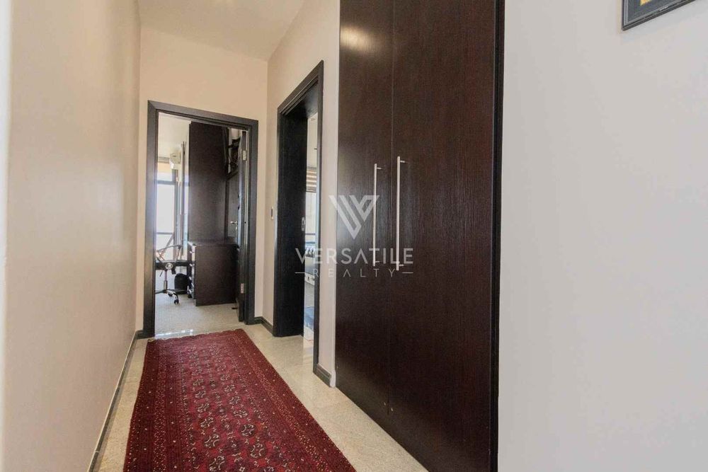 62 - Passage with linen cupboard and entrance to Guest bedroom