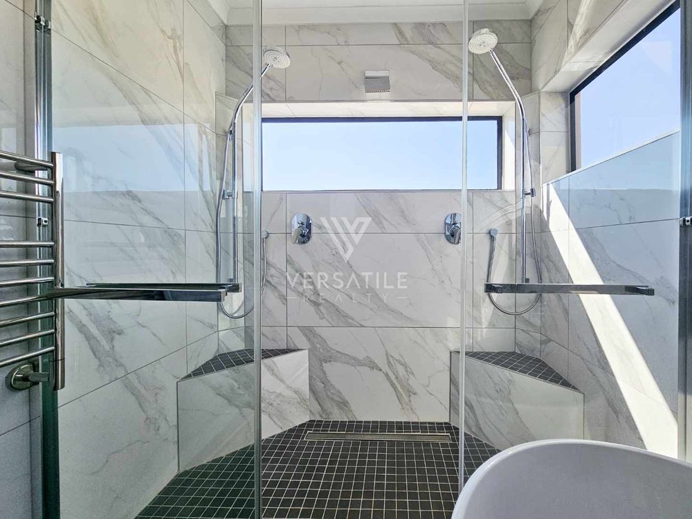 87 - Double adjustable shower units and waterfall shower head  