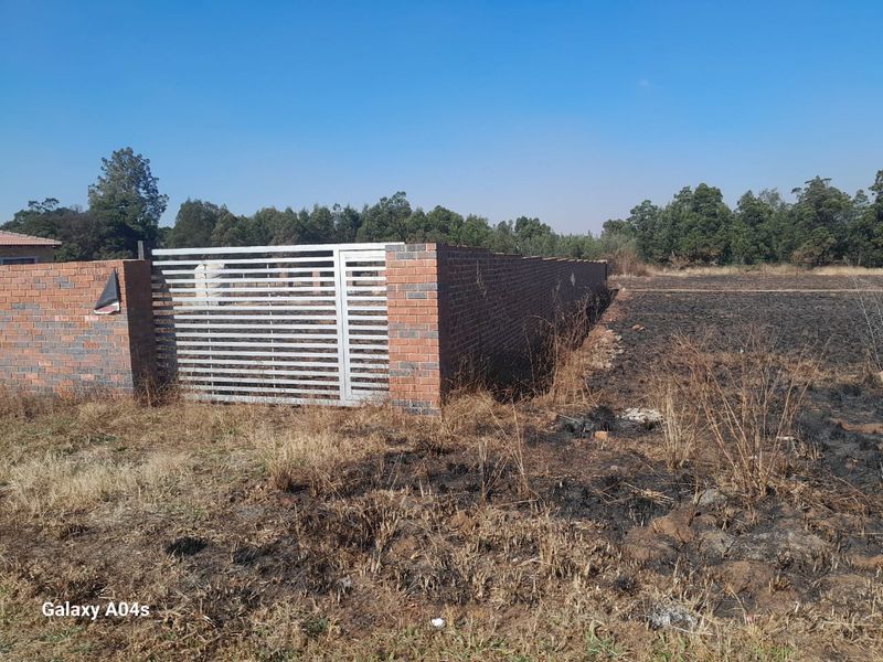 Walled Vacant Stand Inside Boomed Area With a Borehole Dug - Photo 2