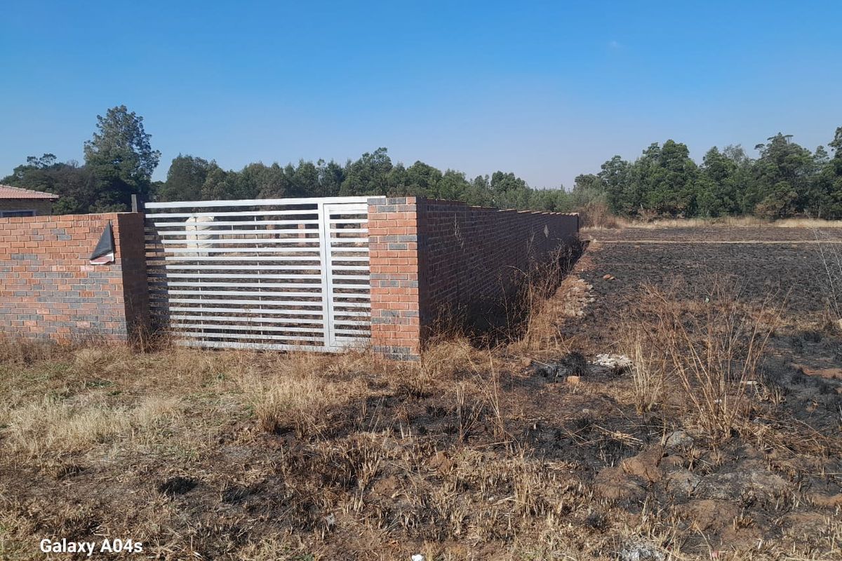 Walled Vacant Stand Inside Boomed Area With a Borehole Dug - Photo 2