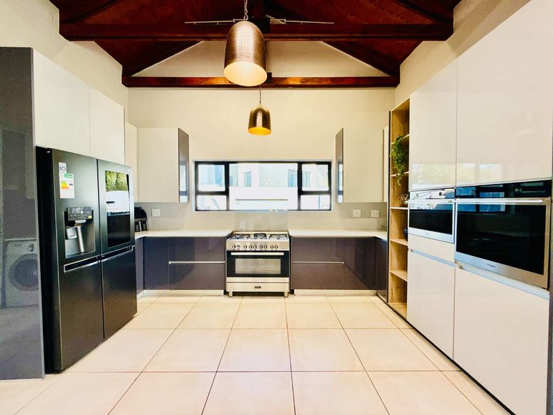 Modern Single Level Family Home on the Green Belt in Copperleaf Golf Estate - Photo 2