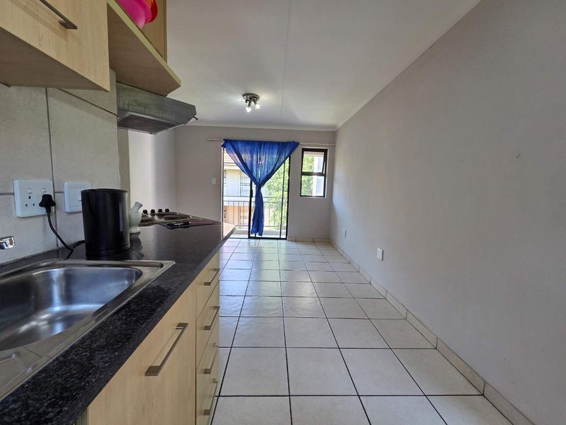 "Invest or Settle: Charming Unit at Racecourse View!" - Photo 2