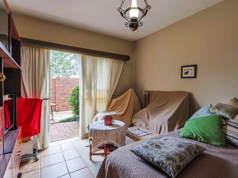 Secure 3 Bedroom Townhouse with Private Garden in a Well-Maintained Complex - Photo 9