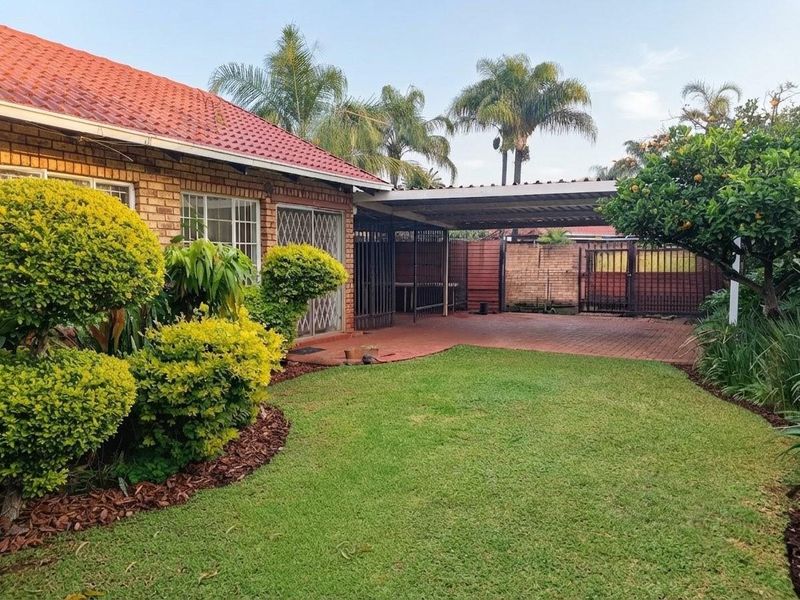 Exceptionally Secure Two-Bedroom Townhouse with Private Garden Retreat - Photo 2