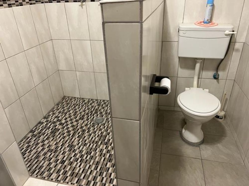 Guest bathroom for guest bedrooms and pool area