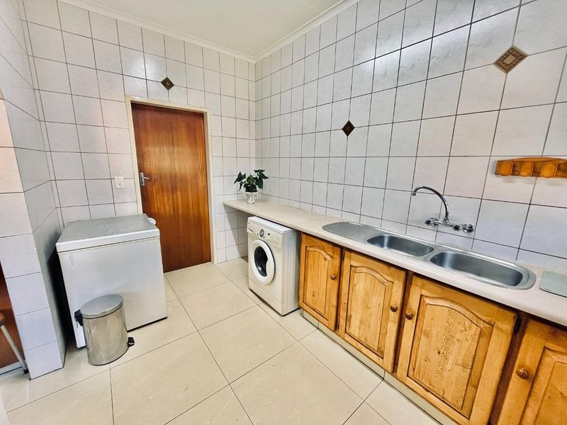 Spacious Family Home with Pool & Braai Area - Photo 9
