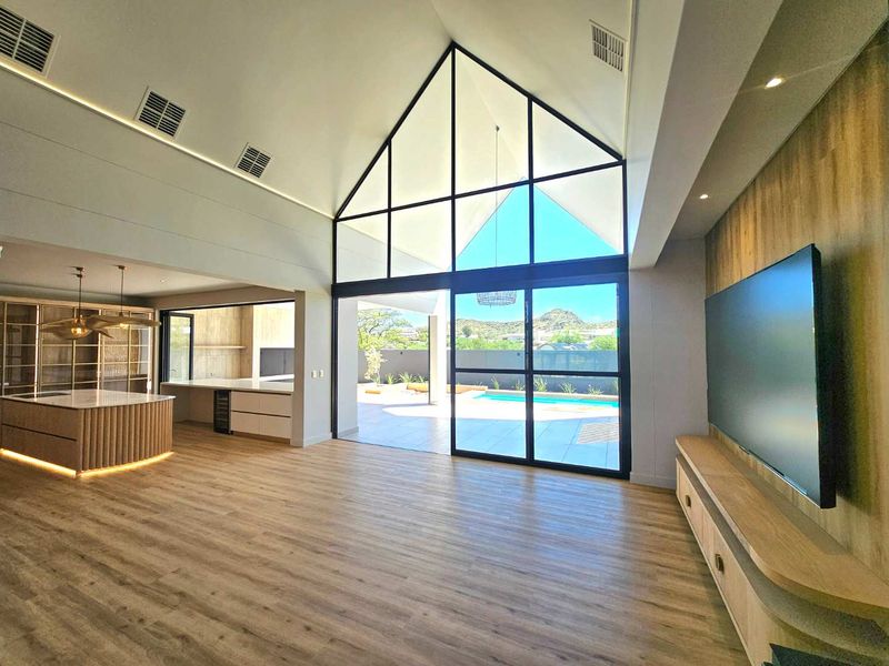 Modern Elegance: Stunning New 3-Bed Home with Pool - Photo 6