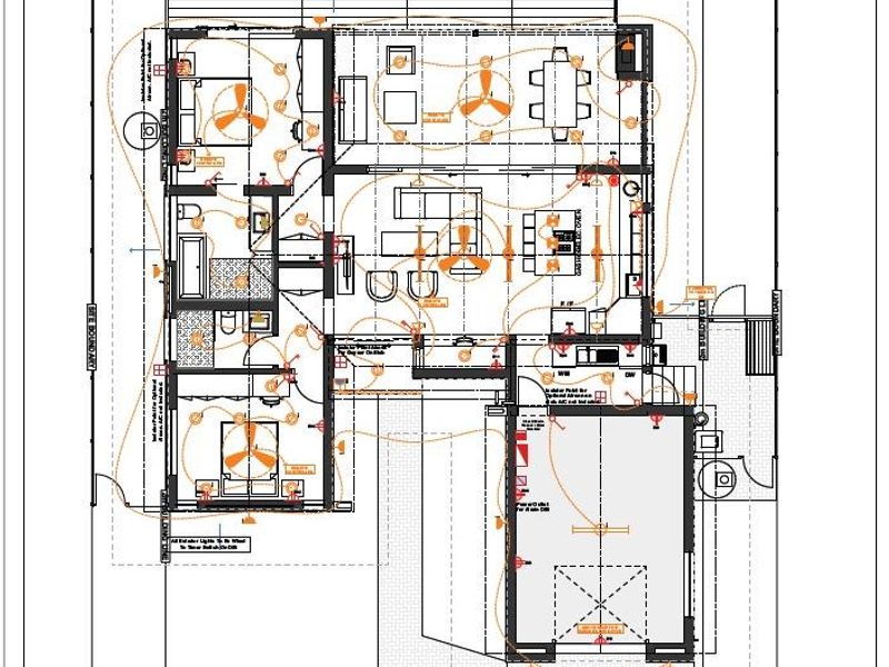 A detailed electrical and lighting floor plan for the residential property, illustrating the layout of fixtures and site boundaries.