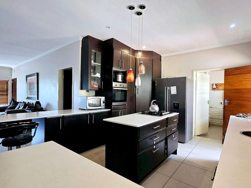 Spacious Family Living Meets Modern Off-Grid Convenience in Meyerspark - Photo 3