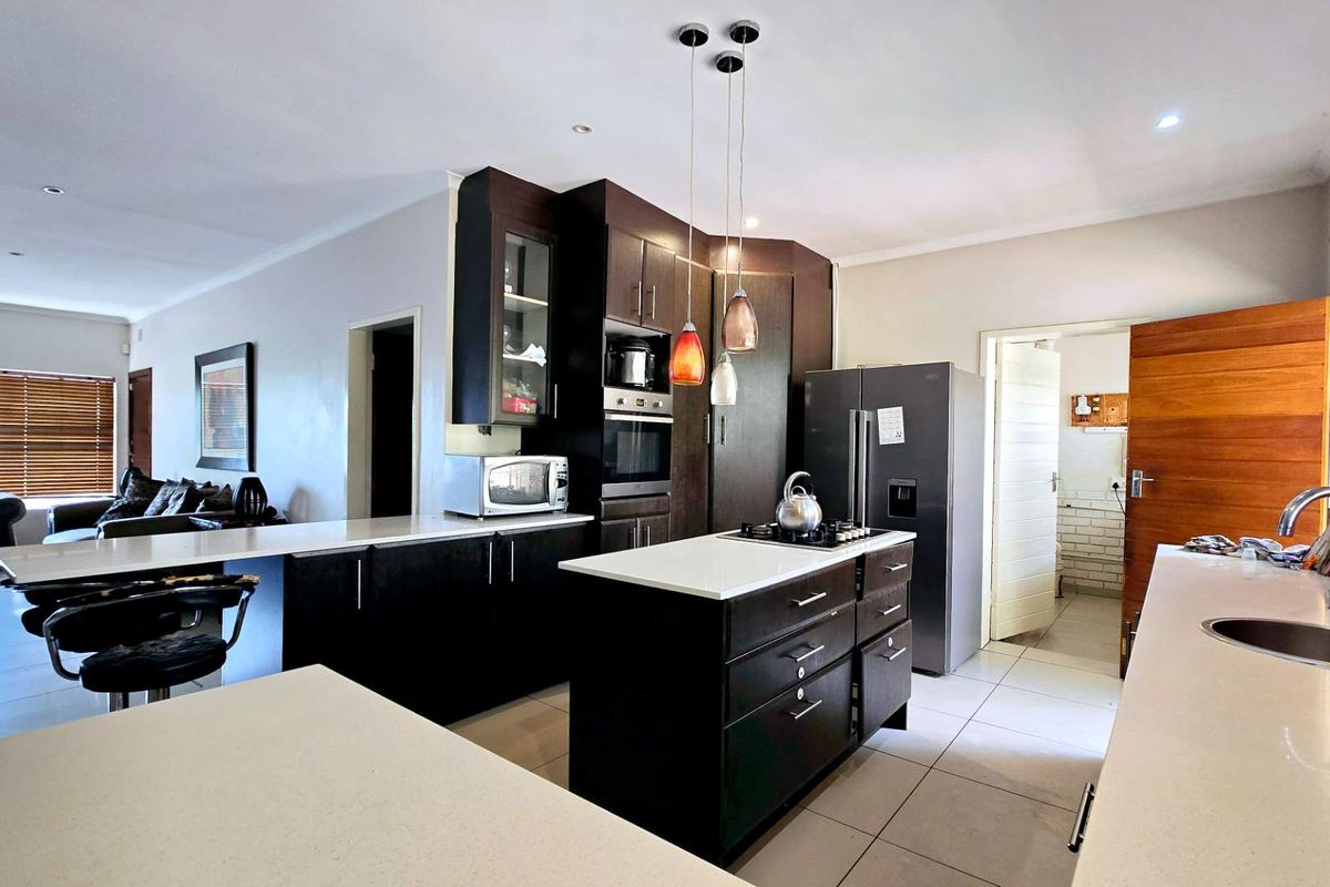 Spacious Family Living Meets Modern Off-Grid Convenience in Meyerspark - Photo 3