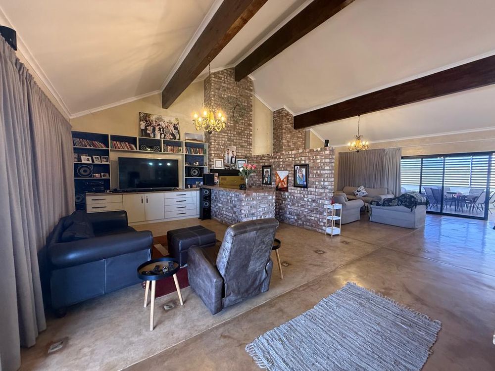 Open plan kitchen, dining area and two lounges