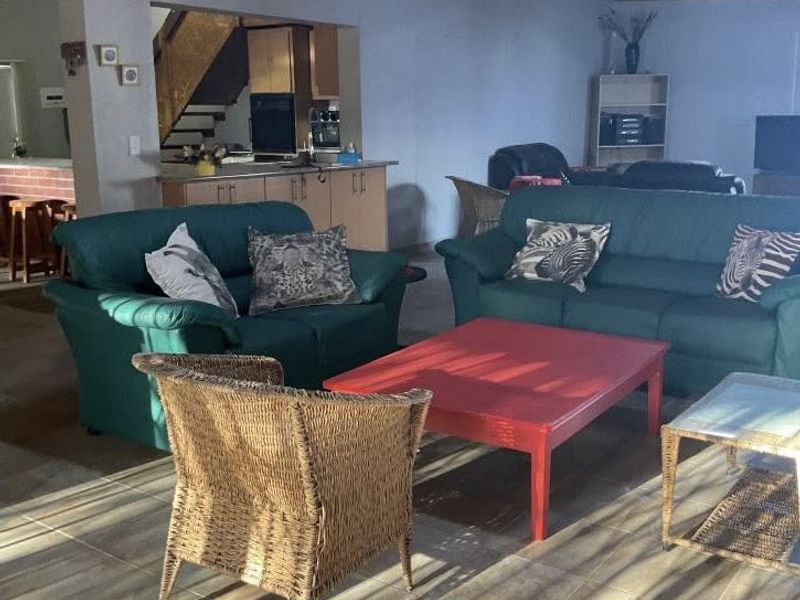 A fully furnished holiday retreat with charm – this spacious double-storey thatch-roof home offers comfort, style, and the perfect coastal lifestyl - Photo 3