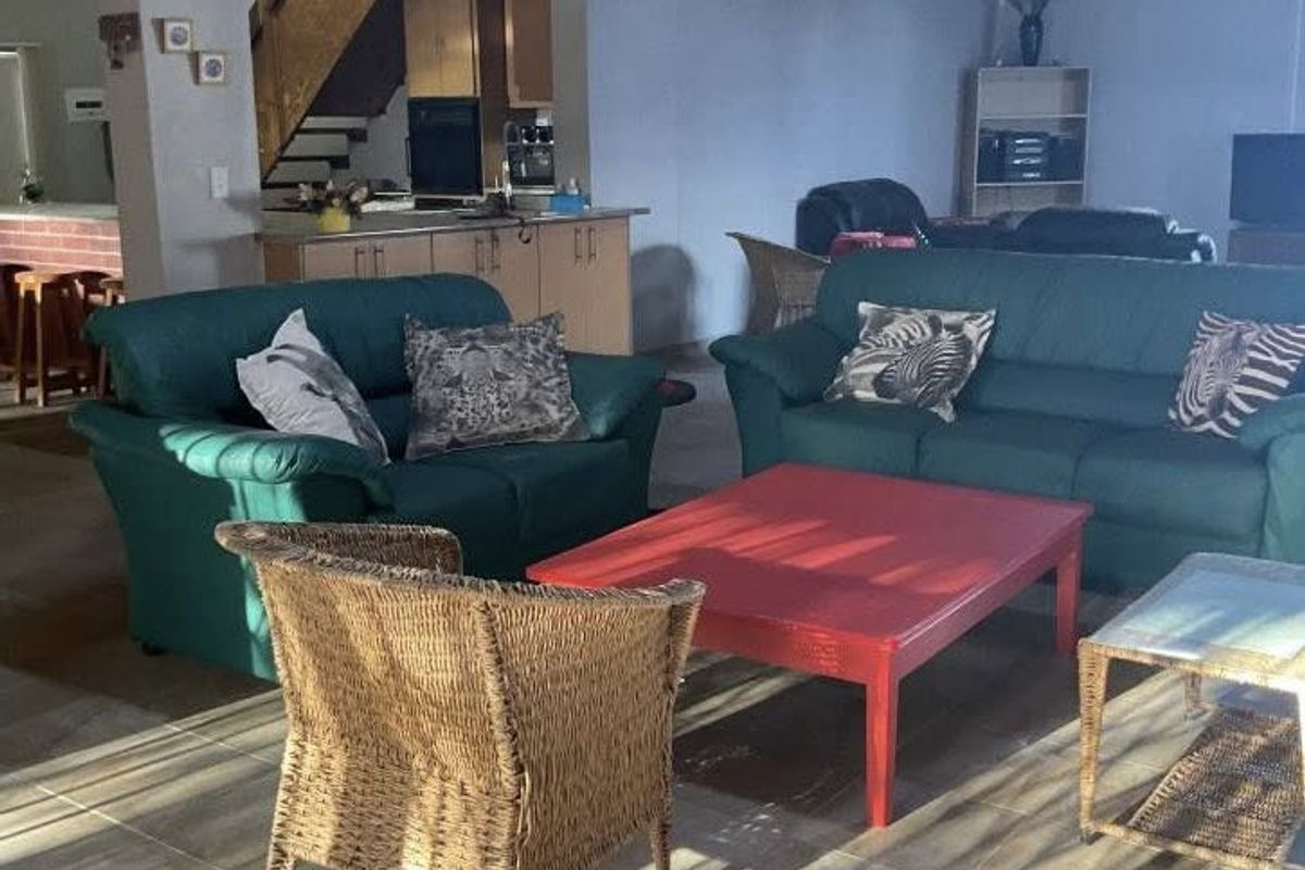 A fully furnished holiday retreat with charm – this spacious double-storey thatch-roof home offers comfort, style, and the perfect coastal lifestyl - Photo 3