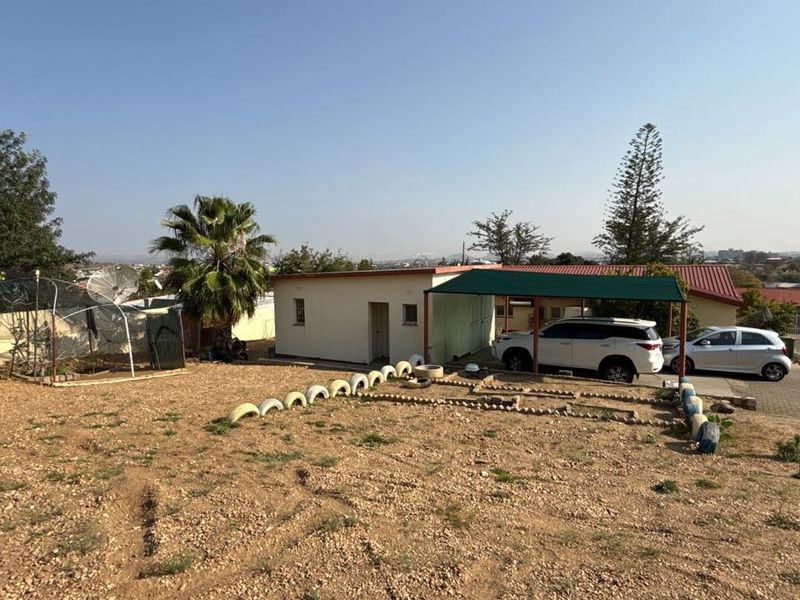 Set high above street level on a massive erf with a large front garden and elevated views - Photo 5