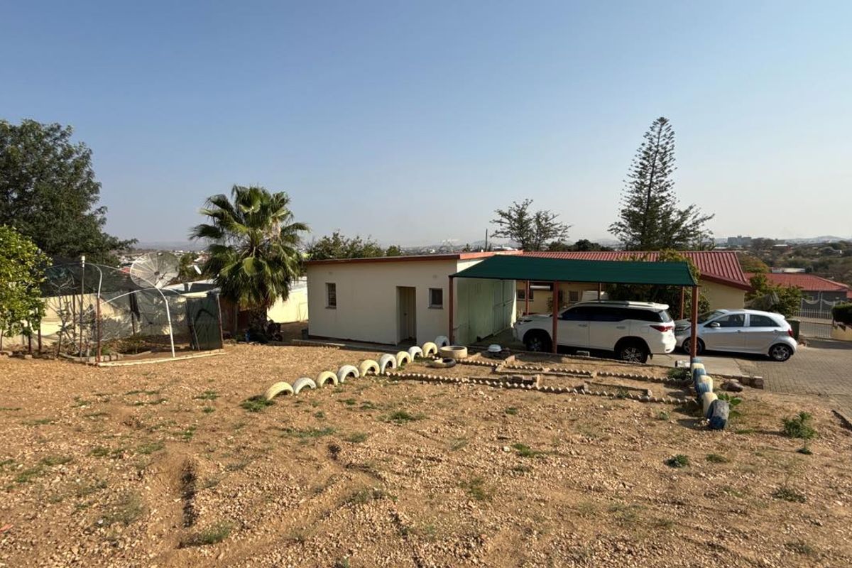 Set high above street level on a massive erf with a large front garden and elevated views - Photo 5