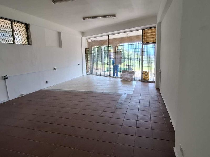 **Prime Business Opportunity in a Strategically Designed Shopping Center** - Photo 2