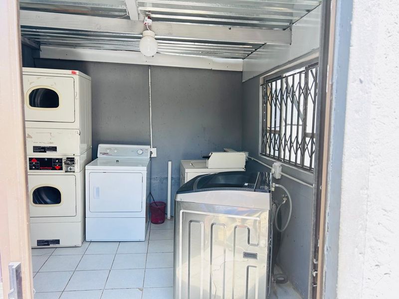 LUCRUTIVE BUSINESS WITH 12 UNITS AND A LAUNDRY!! - Photo 7