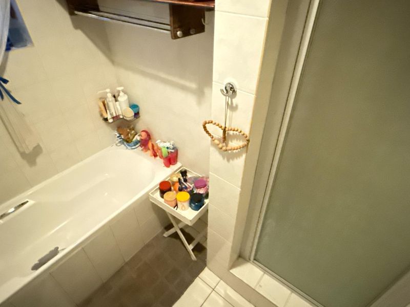 Charming Ground-Floor Gem: Convenience & Style Await! - Photo 9