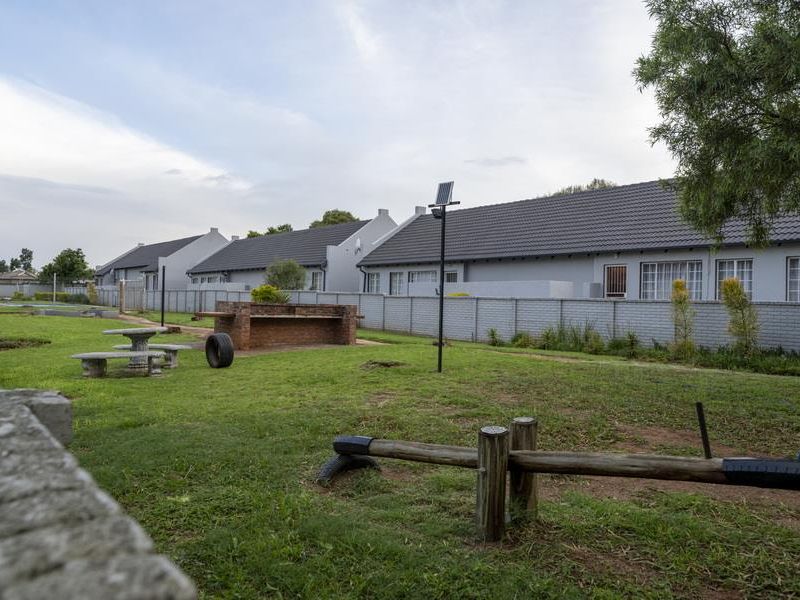 SECURE LIVING WITH POTENTIAL: 2-BEDROOM HOME WITH CHARM - Photo 5