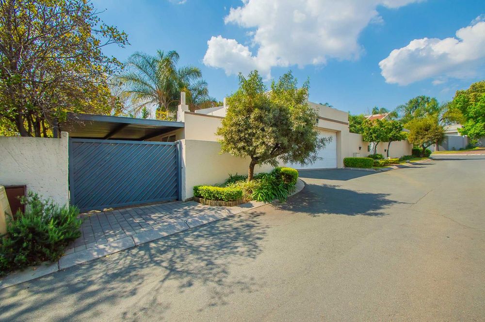 Entrance to property with additional carport