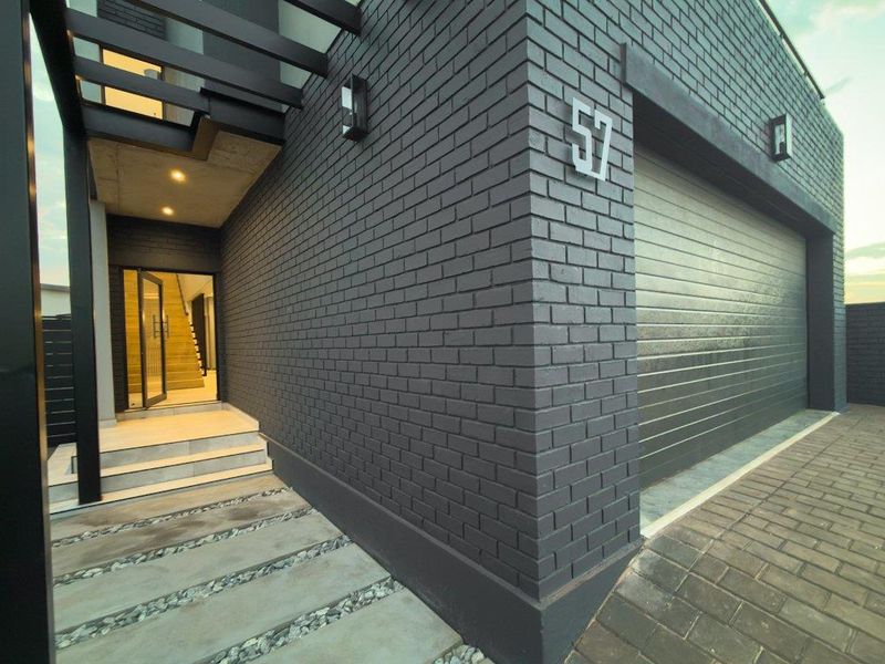 Overview  This modern double-storey home offers the perfect combination of style, privacy, and functional family living.  Designed with comfort - Photo 6