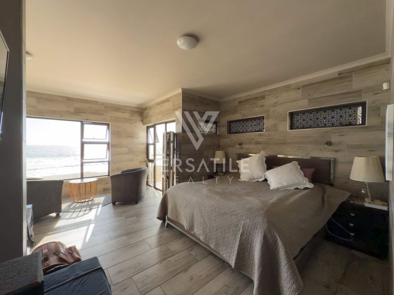 Luxury Beachfront Living – Exceptional 4 Bedroom Home with Unmatched Views - Photo 3