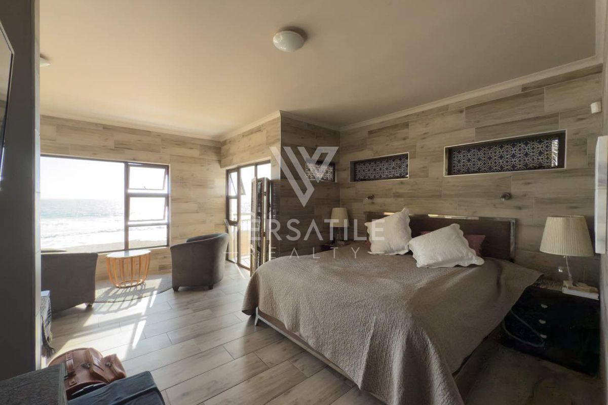Luxury Beachfront Living – Exceptional 4 Bedroom Home with Unmatched Views - Photo 3