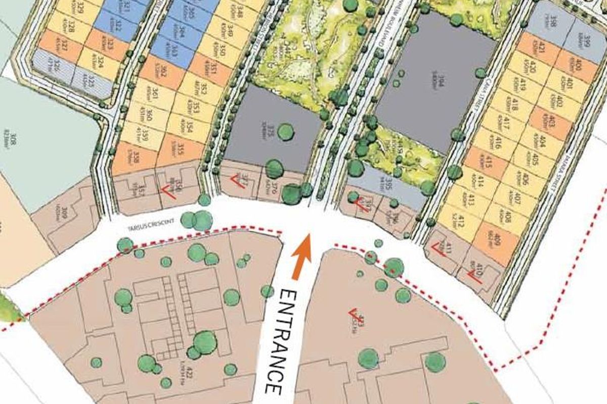 A detailed site development plan showing the layout of commercial land plots, street access, and subdivision boundaries for the property development.