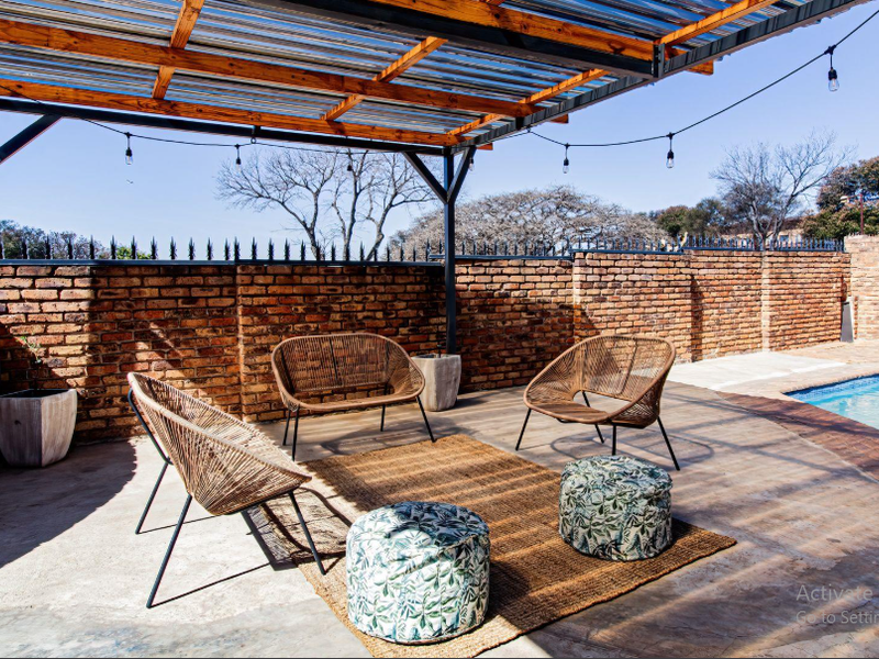 Entertain in Style: Covered Braai with a Pool in This Stunning Home - Photo 4