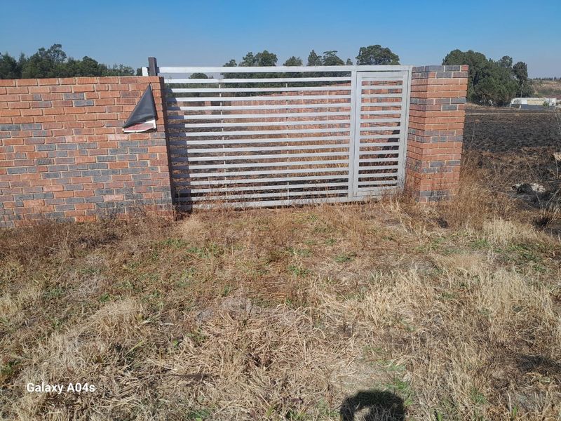 Walled Vacant Stand Inside Boomed Area With a Borehole Dug - Photo 6