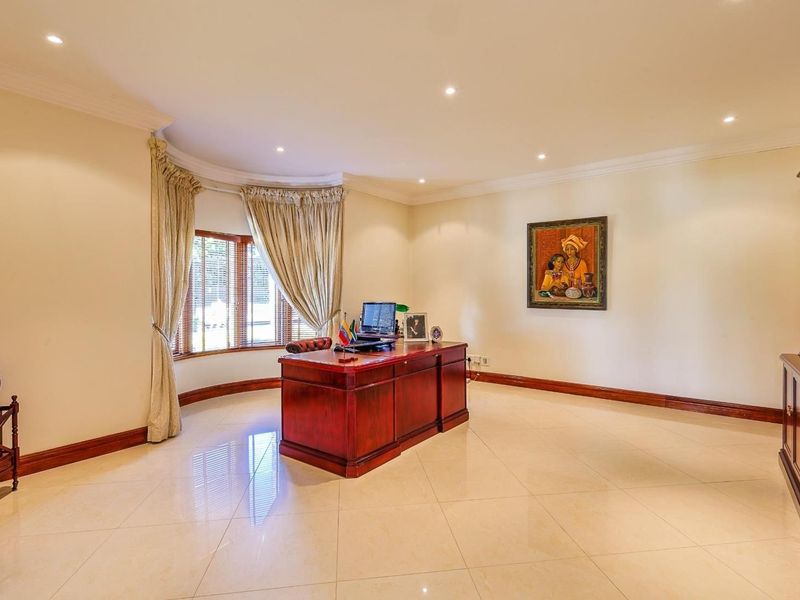 ACHITECTURAL ELEGANCE MEETS FAMILY COMFORT IN WATERKLOOF RIDGE - Photo 9