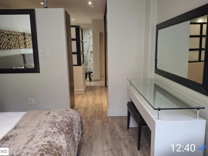 A BEAUTIFULLY FURNISHED TWO BEDROOM APARTMENT - Photo 10