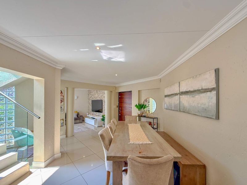Spacious 4-Bedroom Family Home with Pool, Entertainment Areas & Solar Backup in Highveld - Photo 6
